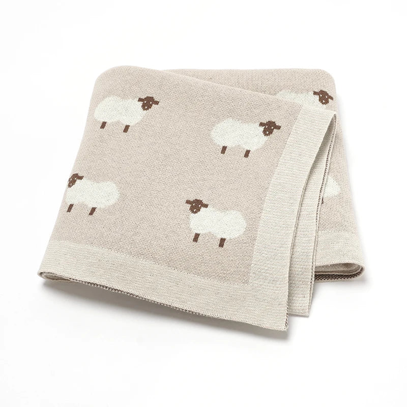 Knitted cotton stroller blanket